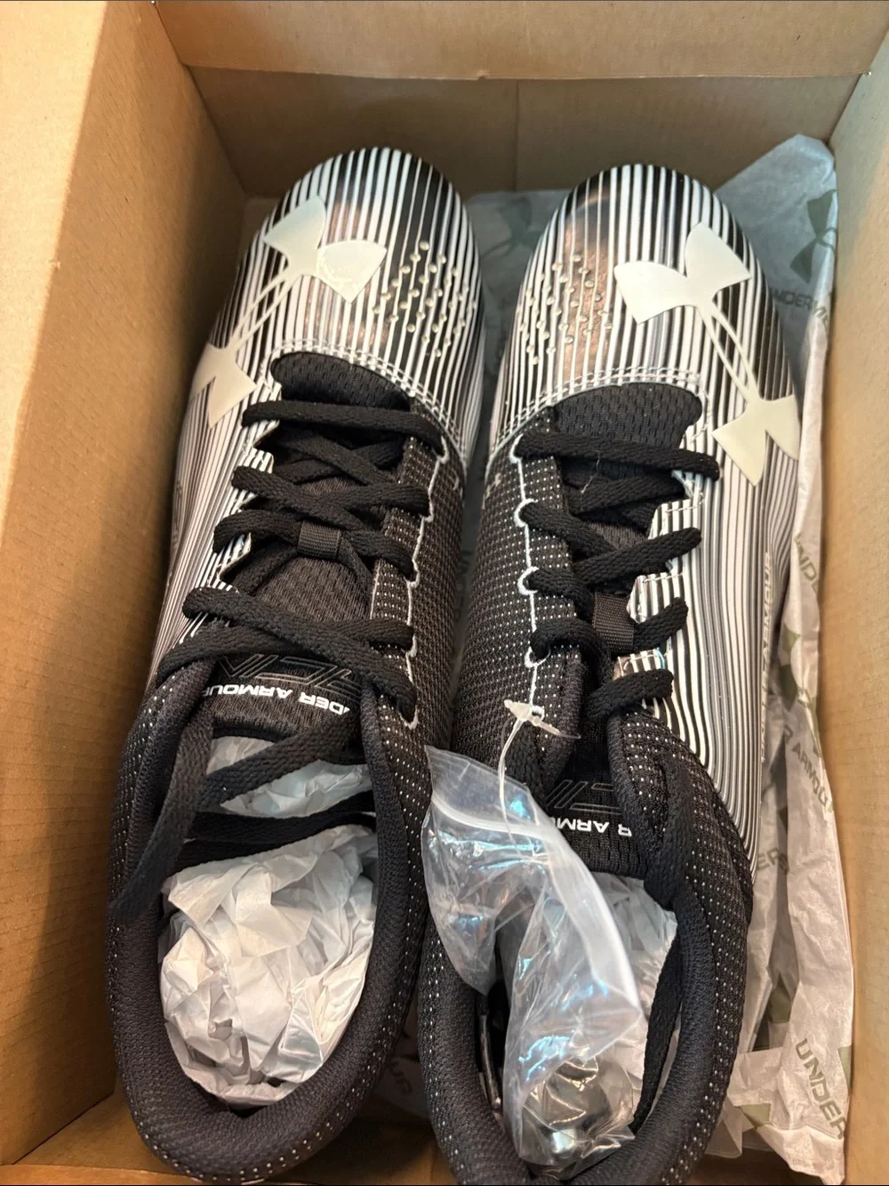 Under Armour Black & White Striped Athletic Cleats
